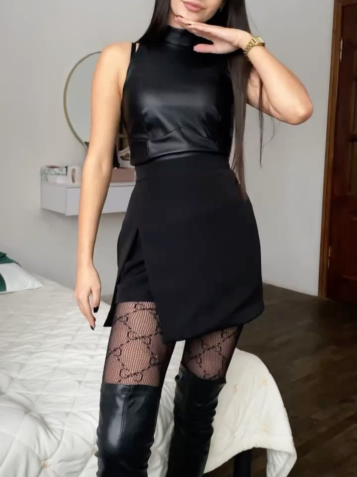 Skorts in Black, High-Waisted Mini - black front view with boots
