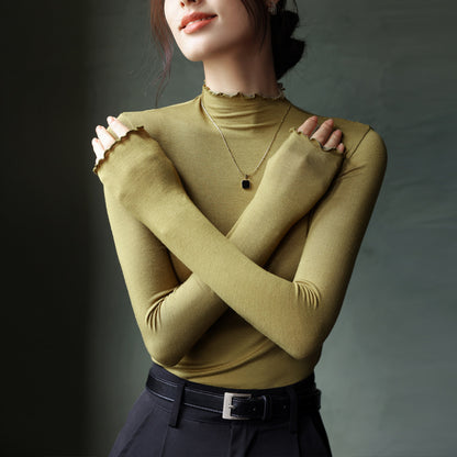 Top in Stretch Mock Neck with Ruffle Trim - mustard yellow cross-arm view