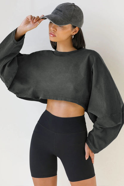 Crop Sweatshirt with Balloon Sleeves in Washed Neutrals - dark grey front view with bike shorts