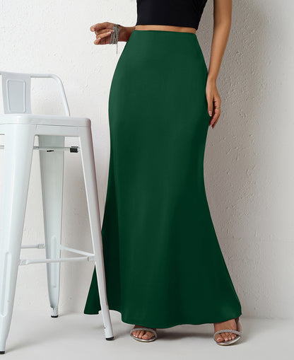 Maxi Skirt in Satin Bias Cut - Dark green front view with stool