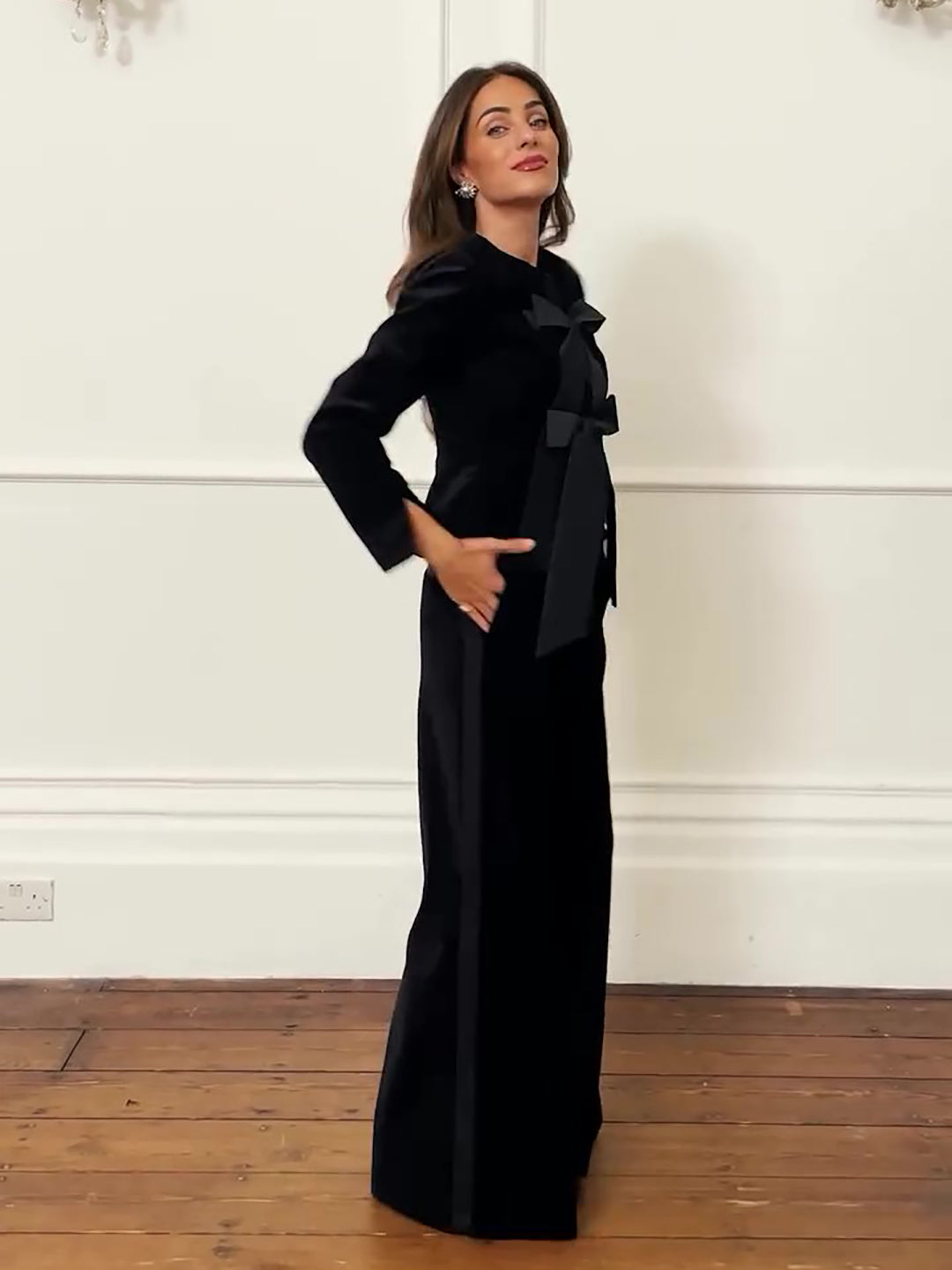 Black Velvet Bow Jacket & Wide-Leg Trouser Suit — full-length front, hands in pockets