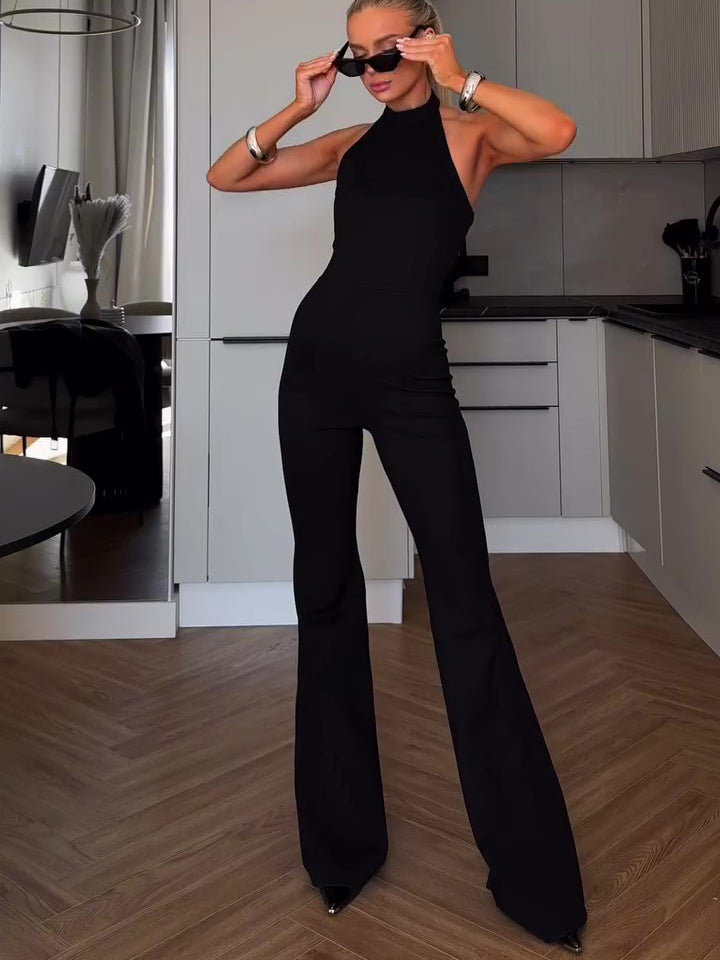 Halter-Neck Wide-Leg Jumpsuit in Black - black side profile view