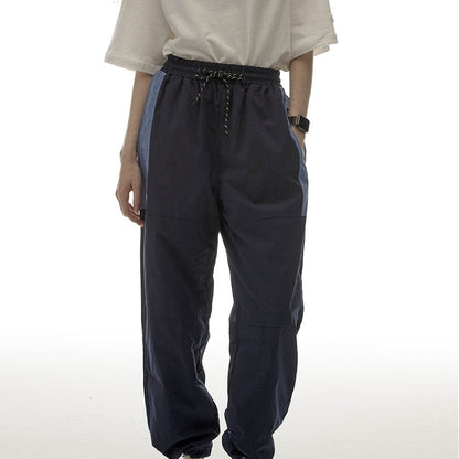 Navy Contrast-Pocket Ankle-Tie Sports Trousers - front waist and leg detail