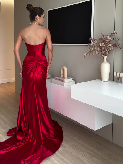 Maxi Evening Dress in Red Satin with Slit and Sheer Bodice - red satin back view with gathered drape and train