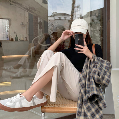 High-Waist Front-Slit Wide-Leg Trousers - apricot seated styling