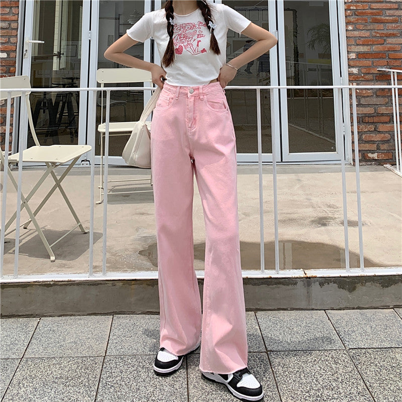 Trousers in Blush Pink High-Rise Wide-Leg Denim - blush pink full-length front view outdoors