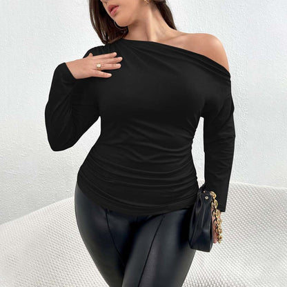 Top in Black with One-Shoulder Neckline and Ruched Waist - black full-length front view with clutch bag