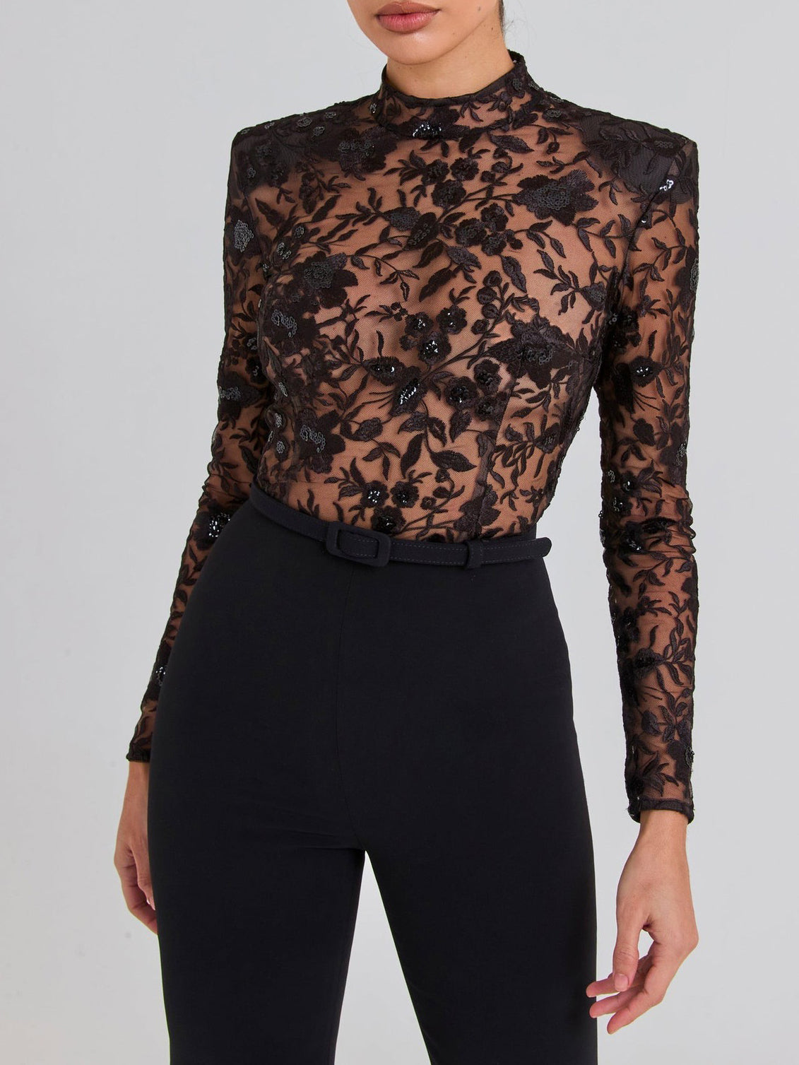 Sheer Lace Long-Sleeve Flared Jumpsuit in Black - black lace bodice and waist detail