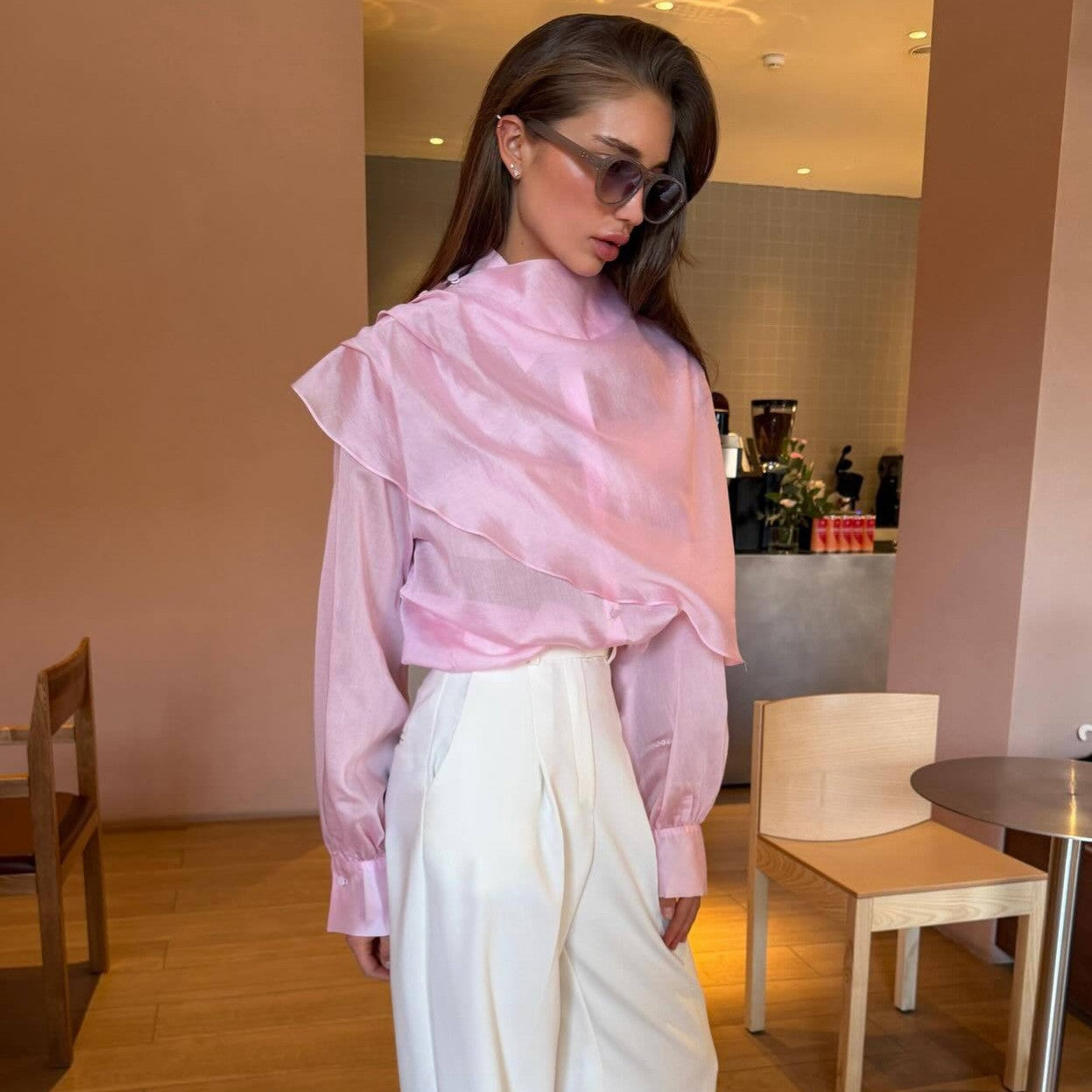 Pink Sheer Long-Sleeve Blouse — front view, styled with white trousers