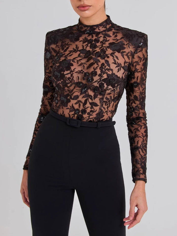Sheer Lace Long-Sleeve Flared Jumpsuit in Black - black sheer lace bodice close-up
