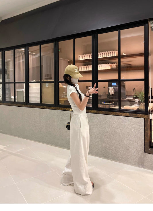 Wide-Leg Trousers in White Linen Blend - white full-length side view
