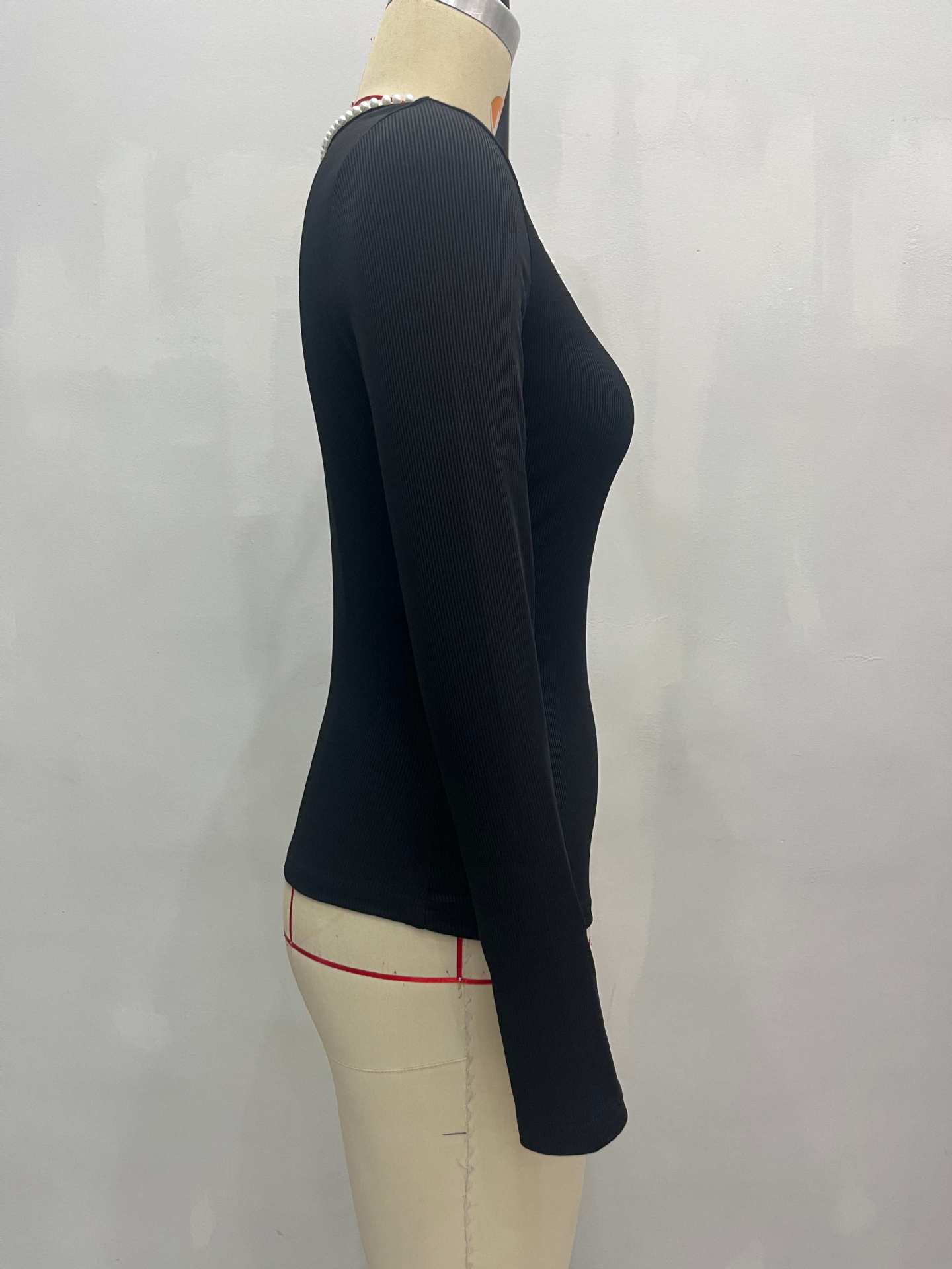 Long Sleeve Top in Black with Pearl-Trim Neckline - black side profile