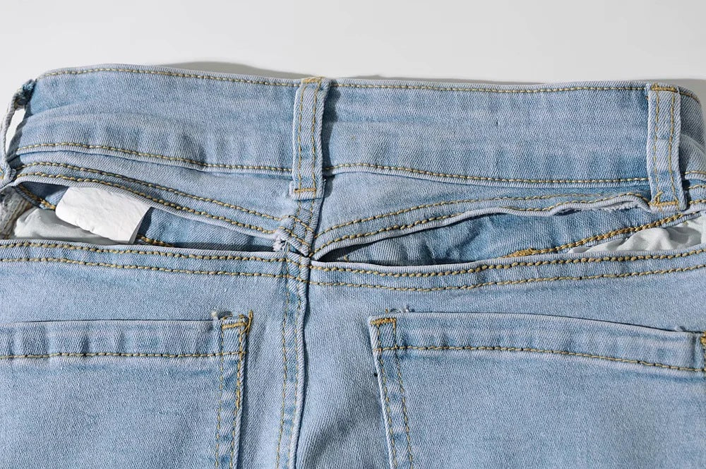 Bootcut Jeans with High Waist and Back Cut-Out - light blue back waistband detail