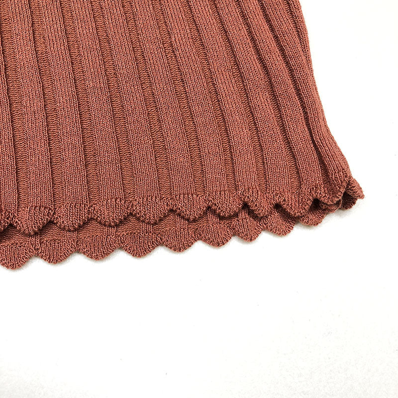 Top in Coffee with Ribbed High Neck and Scalloped Trim - coffee scalloped hem detail