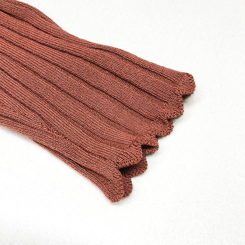 Top in Coffee with Ribbed High Neck and Scalloped Trim - coffee cuff detail
