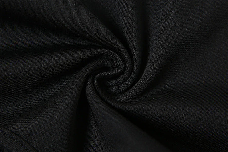 Bodysuit in Black with Open Back and Front Cut-Outs - black fabric texture