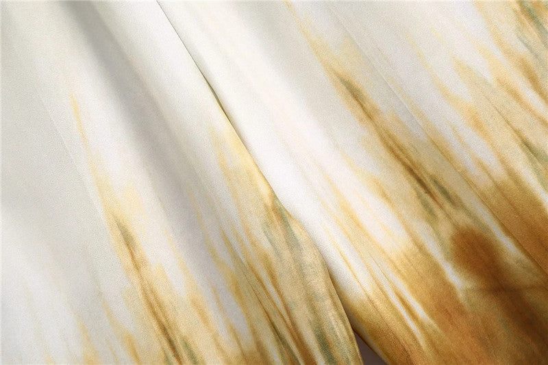 Tie-Dye Wide-Leg High-Waist Trousers - close-up fabric texture, cream and amber tie-dye