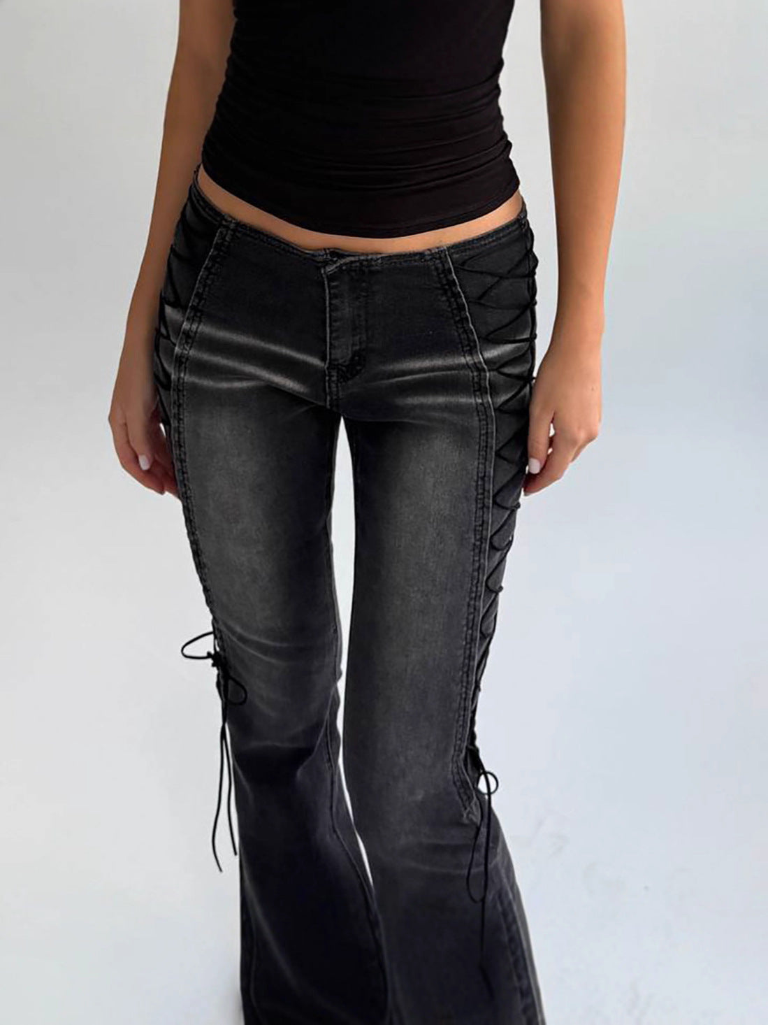 Black Washed Distressed Flare Jeans with Side Lace-Up Detail - styled front view
