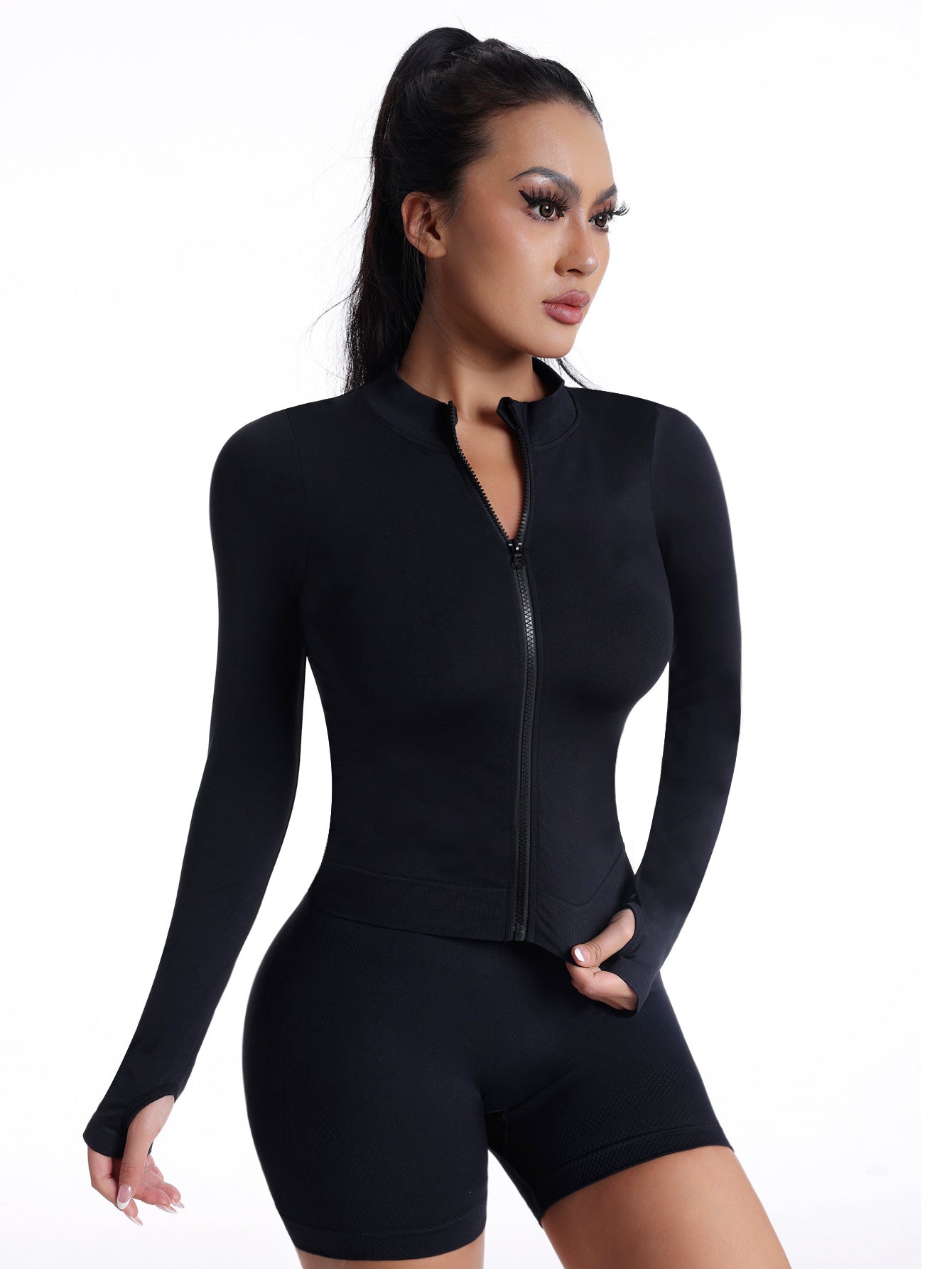Playsuit in Black with Long Sleeves and Zip Front - angled full-length view