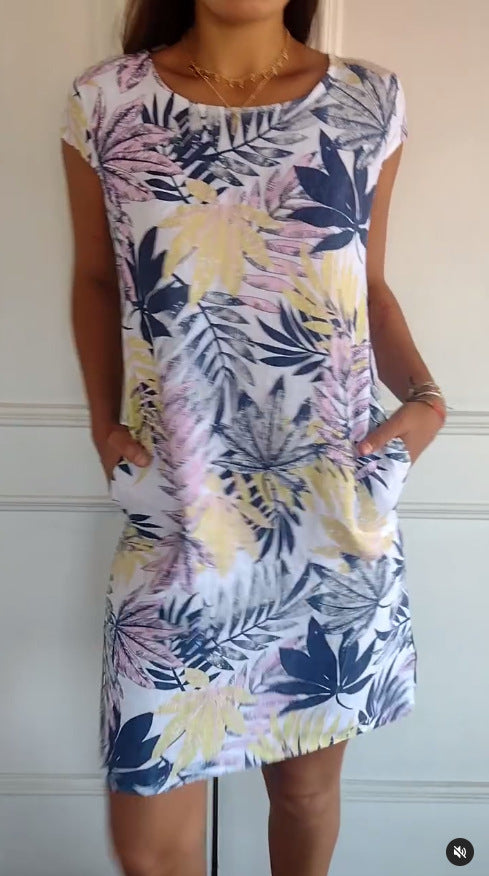 Midi Dress in Tropical Leaf Print with Pockets - white and pastel floral front view