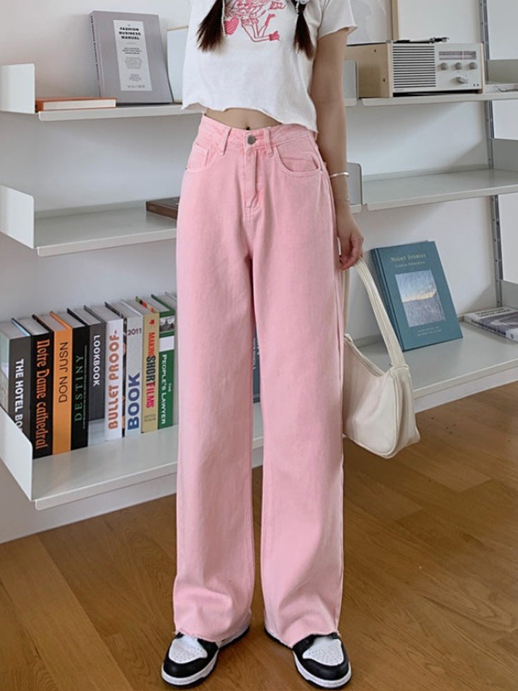 Trousers in Blush Pink High-Rise Wide-Leg Denim - blush pink front view indoors