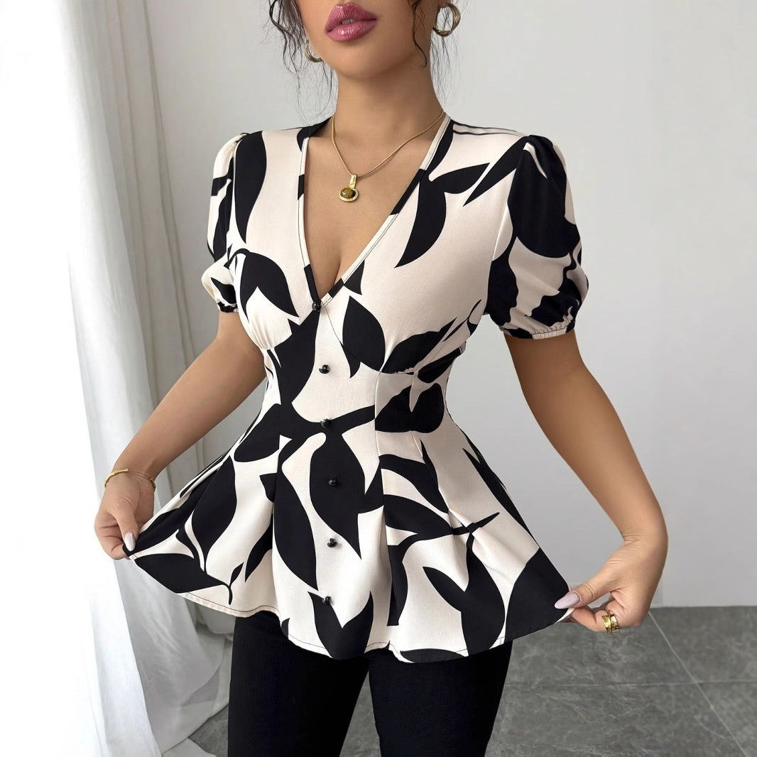 Peplum Blouse in Abstract Print - apricot peplum hem detail