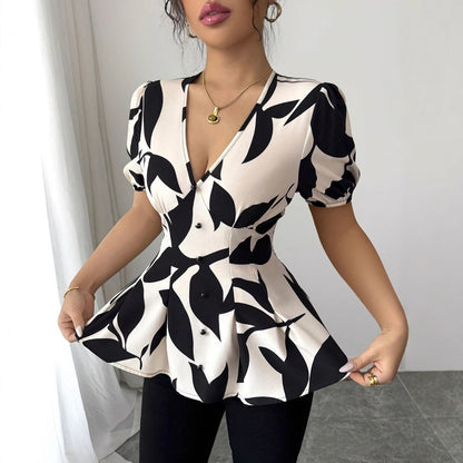 Peplum Blouse in Abstract Print - apricot peplum hem detail