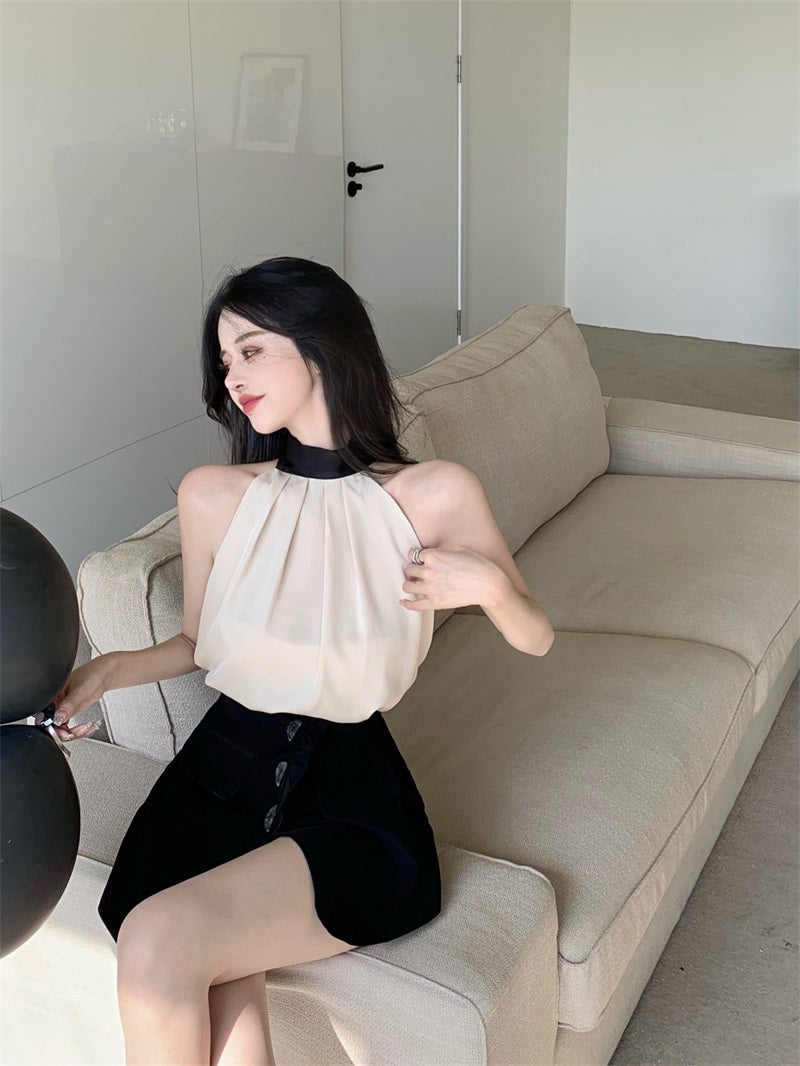 Blouse in Cream Halterneck with Contrast Collar - seated side outfit view