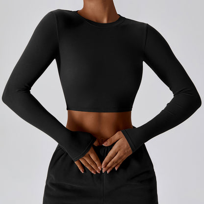 Crop Top with Thumbhole Cuffs in Quick-Dry Stretch - Premium Black front view