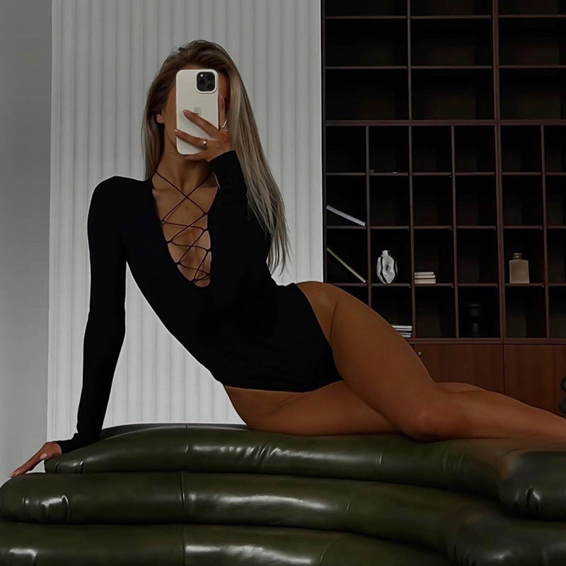 Bodysuit in Black with Long Sleeves and Lace-Up Plunge Neck - black full-length lounging angle